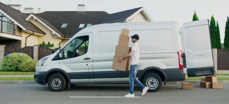 Man carrying moving boxes