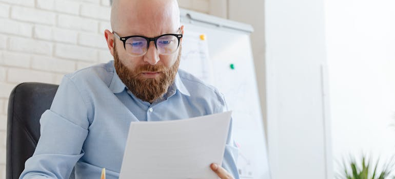 person looking at a document