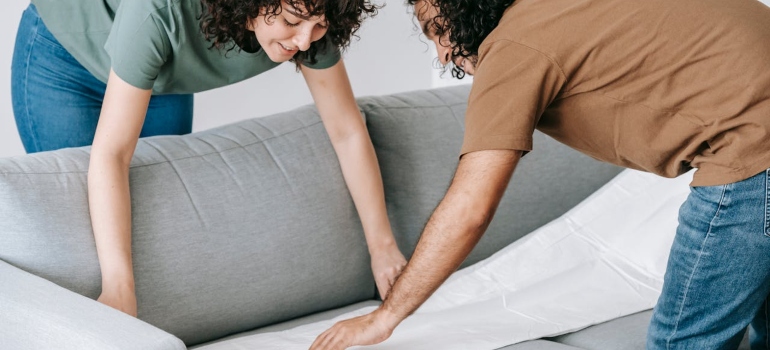 A couple planning to move their couch