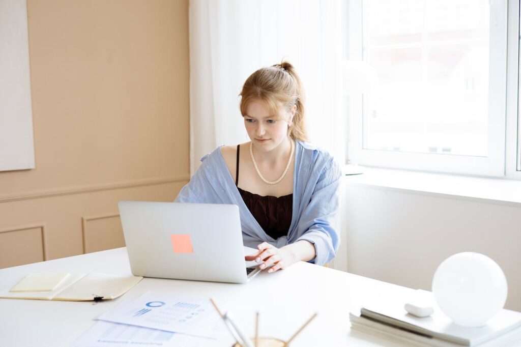 Woman researching movers jackson mi​