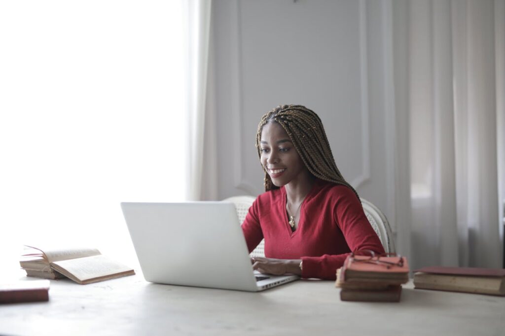 A woman researching moving companies dearborn mi​