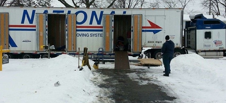 All Around Moving & Storage parked on a snowy street